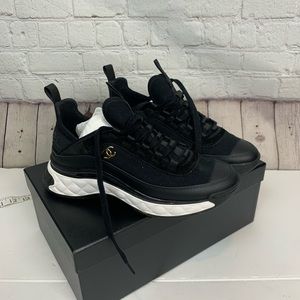 Chanel black and white Sneakers 94305 Gold Logo